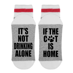 It’s not drinking alone if the cats home Socks
